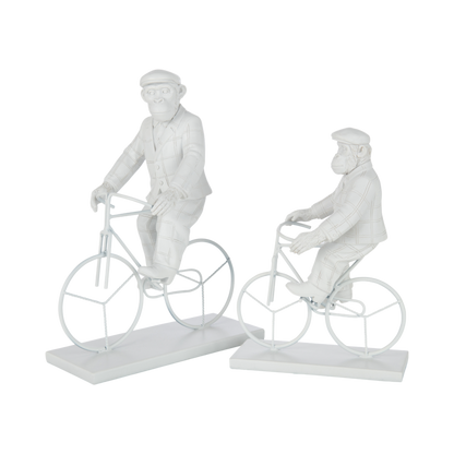 Singe vélo blanc